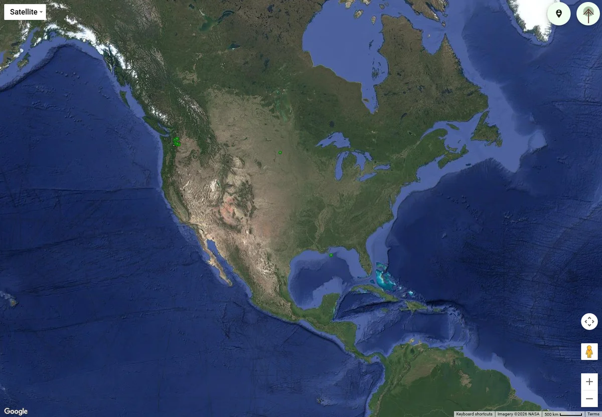 ComTree's live satellite map showing geographic tree markers and map controls